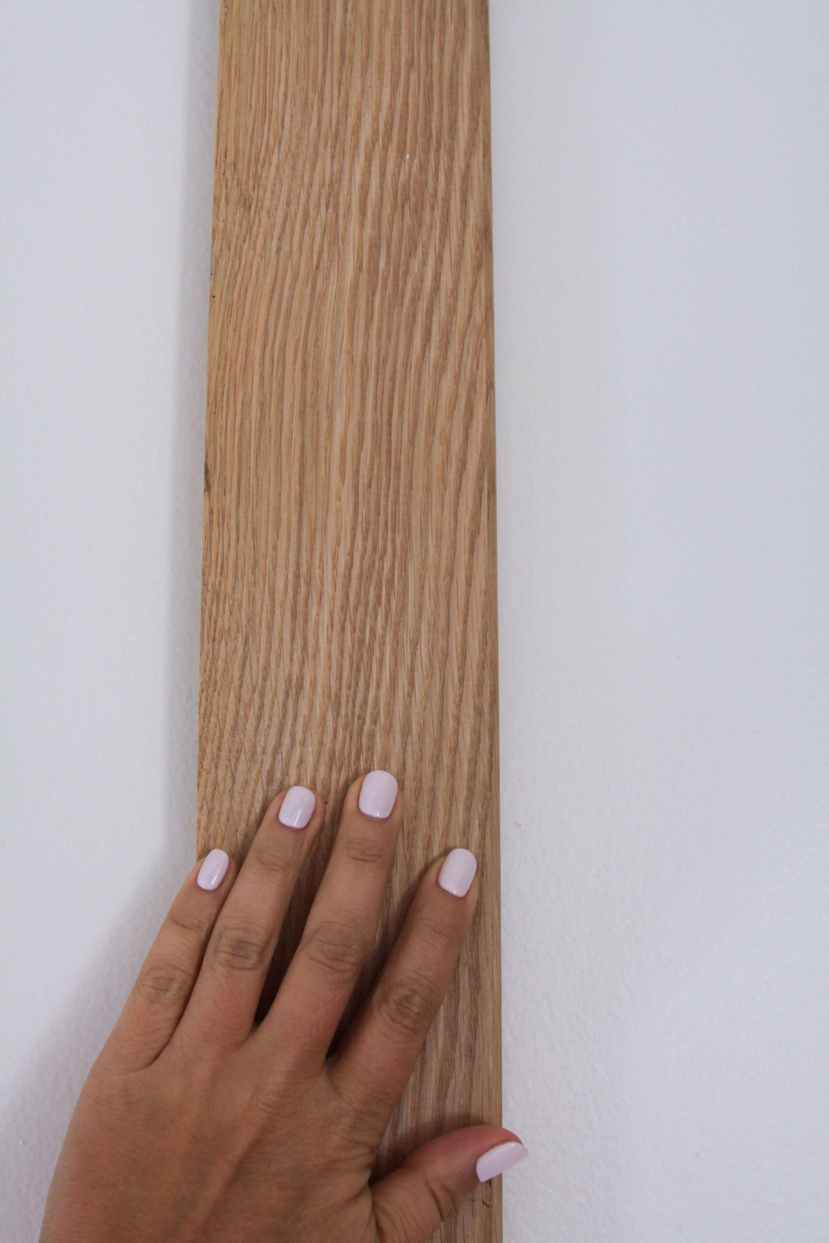 white oak plank paired against swiss coffee painted walls