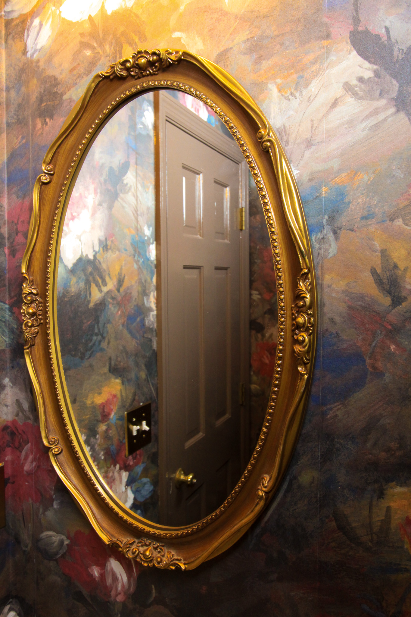 powder room redesign vintage mirror