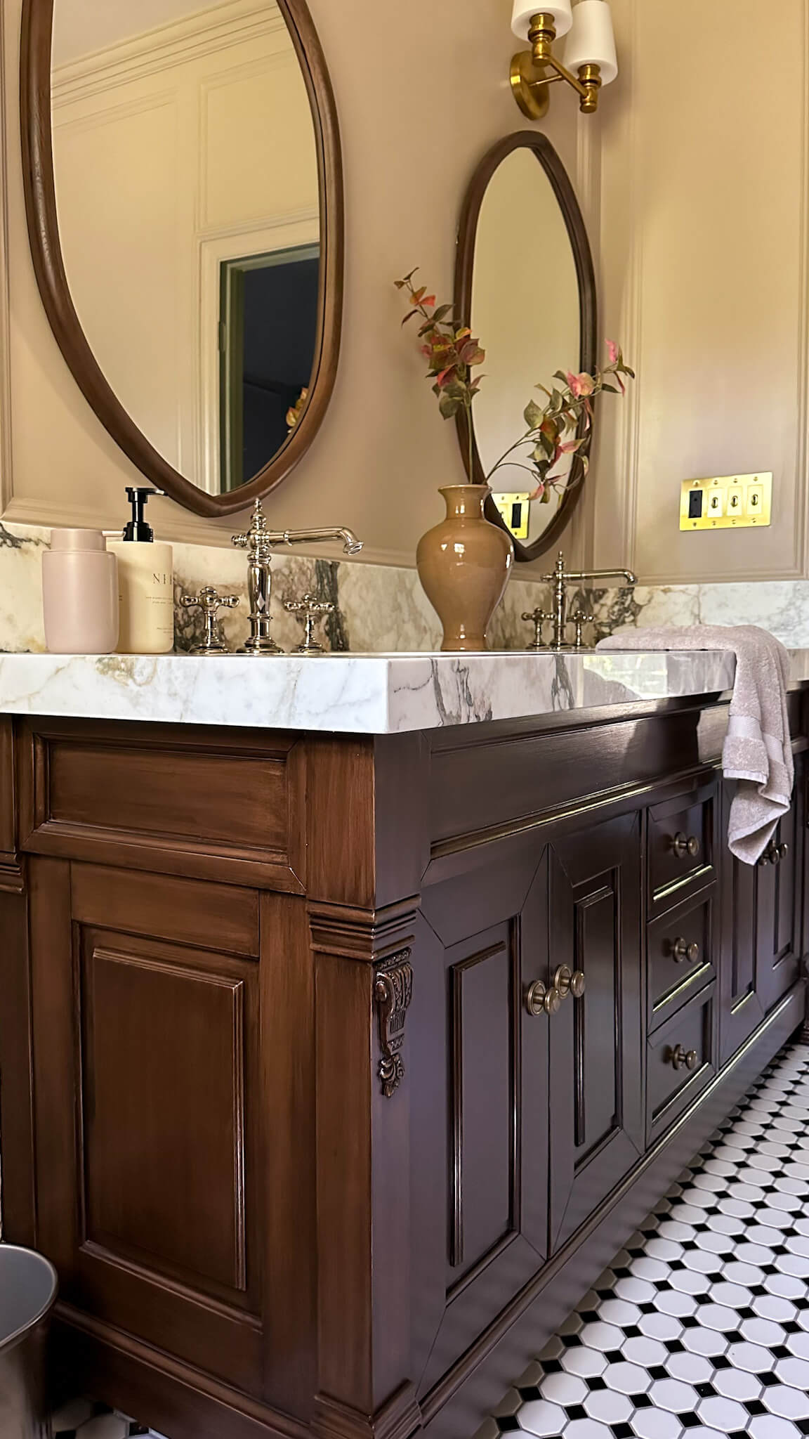 Learn how to update your bathroom vanity on a budget using liquid wood and gel stain.