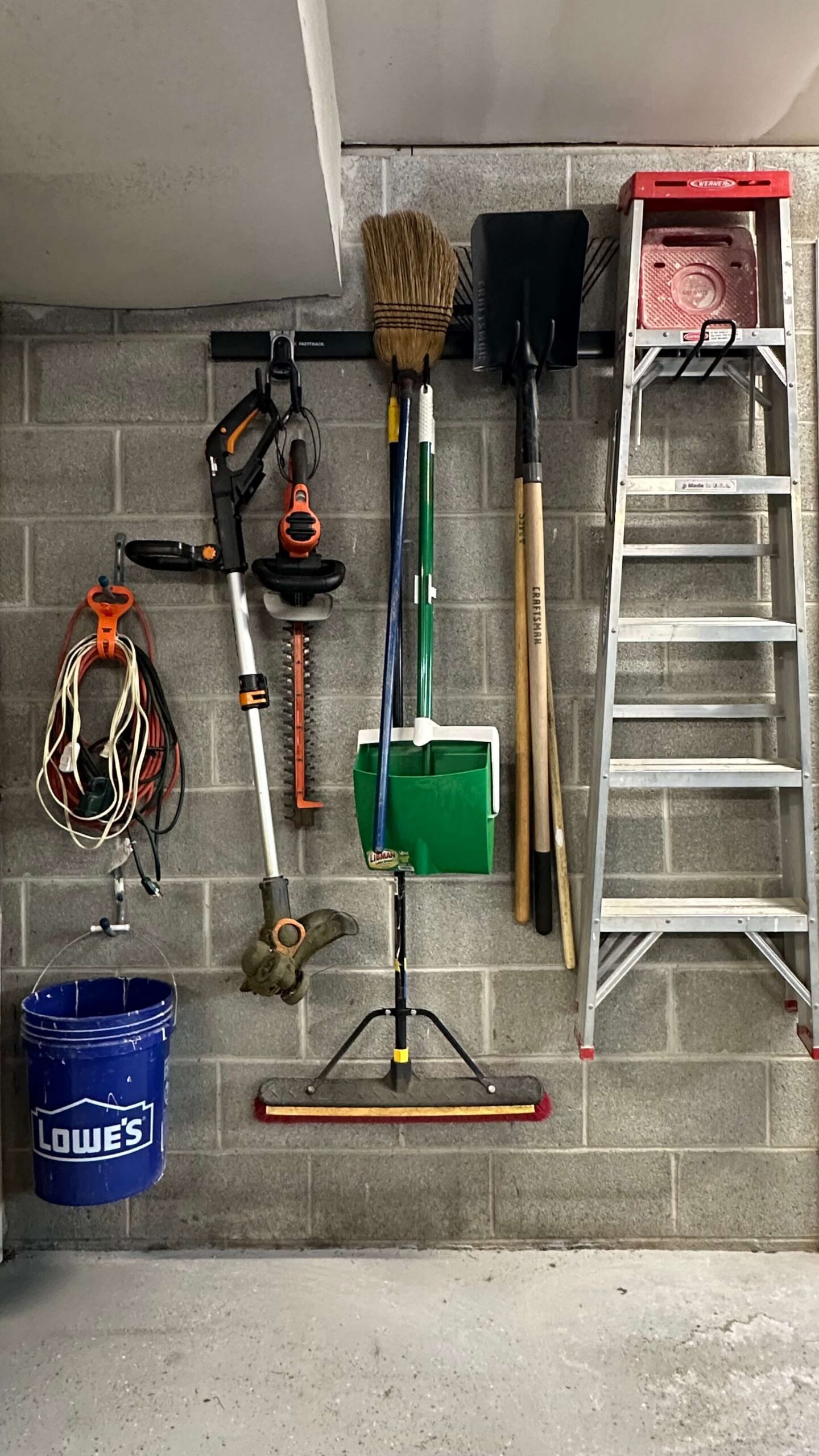 learn how to drill into concrete block to hang things