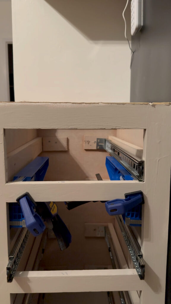 installing soft close drawer slides inside the cabinet
