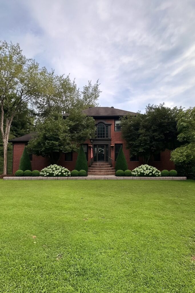 landscaping design option one for phase two of the exterior makeover project (keeping the pink magnolia trees)